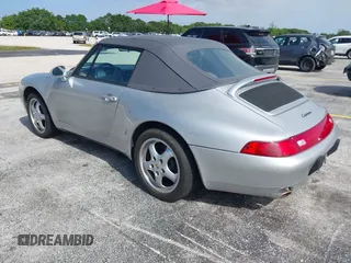 1998 Porsche 911 Carrera with VIN WP0CA2992WS340996, listed as a IAAI auction lot 42002177 with 47,222 mi miles. Bid and sale history available at carsss.com. Image 3.