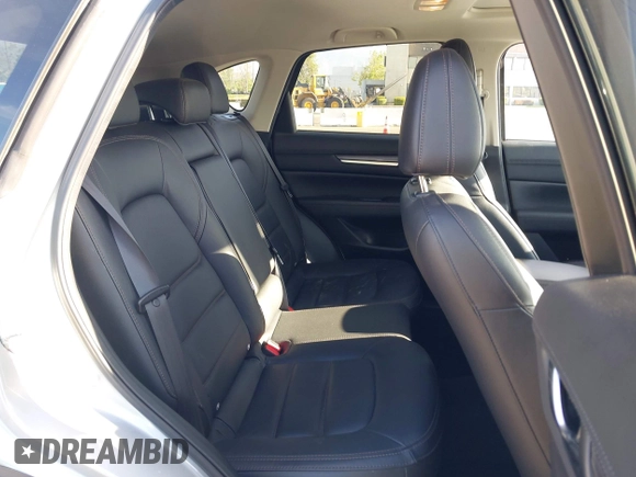2021 Mazda CX-5 Grand Touring with VIN JM3KFADM1M1393251, listed as a IAAI auction lot 42072862 with 47,758 mi miles. Bid and sale history available at carsss.com. Image 8.