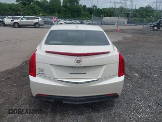 2014 Cadillac ATS Standard RWD with VIN 1G6AA5RA5E0173517, listed as a IAAI auction lot 42540181 with 73,732 mi miles and . Bid and sale history available at DreamBid. Image 16.
