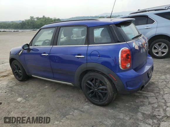 2016 MINI Countryman S with VIN WMWZC5C59GWU02414, listed as a Copart auction lot 59950285 with 106,151 mi miles and Salvage title. Bid and sale history available at DreamBid. Image 2.