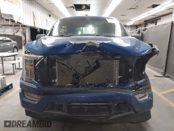 2022 Ford F-150 XL with VIN 1FTFW1E82NKE39483, listed as a IAAI auction lot 42591423 with 51,701 mi miles and . Bid and sale history available at DreamBid. Image 12.