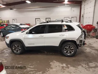 2019 Jeep Cherokee Trailhawk with VIN 1C4PJMBX4KD390061, listed as a IAAI auction lot 42007112 with 72,227 mi miles and . Bid and sale history available at DreamBid. Image 14.