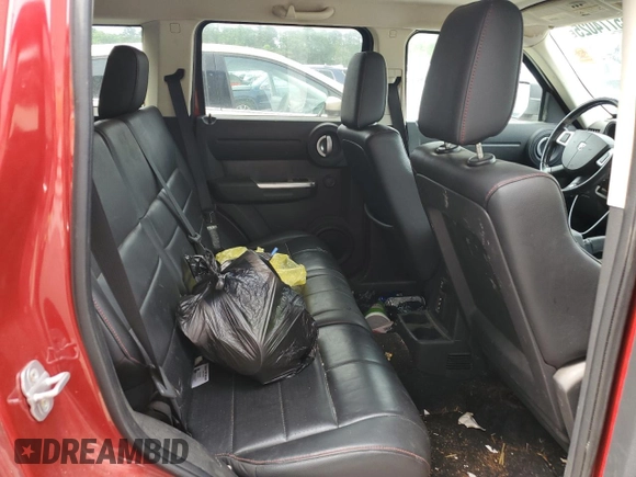 2007 Dodge Nitro R/T z VIN 1D8GT58637W731719, wystawiony jako Copart lot #55774025 z przebiegiem 138 666 mil mil oraz Szkoda całkowita • Salvage title. Historia ofert i sprzedaży dostępna na DreamBid. Obrazek 11.