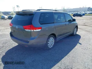 2011 Toyota Sienna LE with VIN 5TDJK3DC1BS016258, listed as a IAAI auction lot 41995140 with 200,903 mi miles. Bid and sale history available at carsss.com. Image 4.