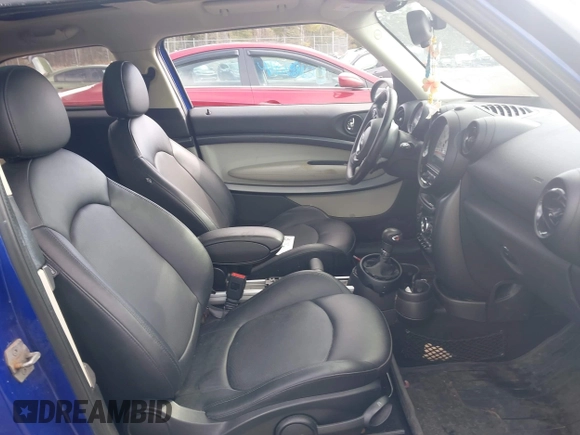 2014 MINI Paceman S with VIN WMWSS7C51EWN72179, listed as a IAAI auction lot 41823211 with 117,151 mi miles and . Bid and sale history available at DreamBid. Image 5.