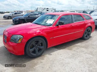 2007 Dodge Magnum R/T with VIN 2D4GV57207H867265, listed as a IAAI auction lot 42093939 with 167,007 mi miles and . Bid and sale history available at carsss.com. Image 2.