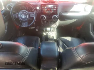 2016 Jeep Wrangler Unlimited Rubicon with VIN 1C4BJWFGXGL183011, listed as a Copart auction lot 42310535 with 165,227 mi miles and Salvage title. Bid and sale history available at DreamBid. Image 8.