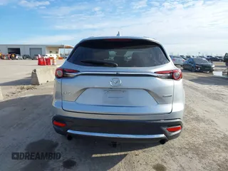 2020 Mazda CX-9 Grand Touring z VIN JM3TCADY7L0416696, wystawiony jako IAAI lot #41310183 z przebiegiem 105 754 mil mil oraz . Historia ofert i sprzedaży dostępna na DreamBid. Obrazek 16.
