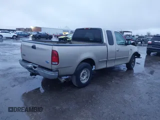 1999 Ford F-150 XL with VIN 1FTRX17L1XNA06282, listed as a IAAI auction lot 41545503 with 234,817 mi miles. Bid and sale history available at carsss.com. Image 4.