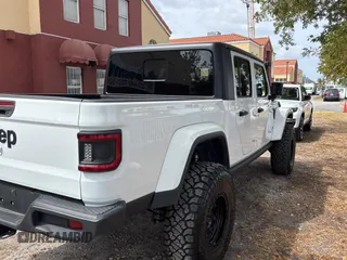 2021 Jeep Gladiator 80th Anniversary with VIN 1C6HJTAG0ML541509, listed as a Copart auction lot 50540975 with 50,754 mi miles and Clean title. Bid and sale history available at DreamBid. Image 4.