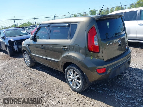 2012 Kia Soul + with VIN KNDJT2A60C7472303, listed as a IAAI auction lot 42126057 with 308,726 mi miles. Bid and sale history available at carsss.com. Image 3.