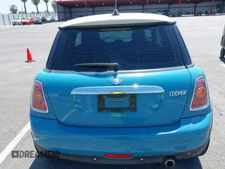 2007 MINI Hardtop with VIN WMWMF335X7TT54929, listed as a IAAI auction lot 42173757 with 71,496 mi miles and . Bid and sale history available at DreamBid. Image 17.