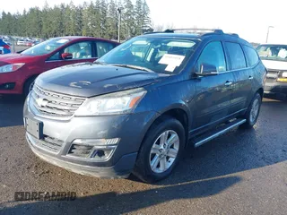 2013 Chevrolet Traverse LT with VIN 1GNKVGKD4DJ210384, listed as a IAAI auction lot 41881058 with 205,045 mi miles and . Bid and sale history available at DreamBid. Image 2.