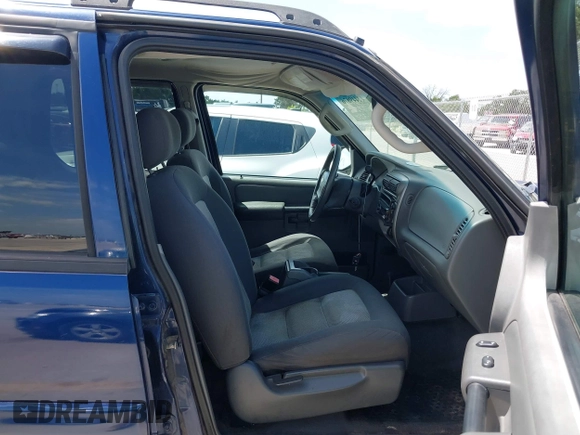 2005 Ford Explorer Sport Trac XLS z VIN 1FMZU67K05UB36386, wystawiony jako IAAI lot #42449876 z przebiegiem 161 181 mil mil oraz . Historia ofert i sprzedaży dostępna na DreamBid. Obrazek 5.