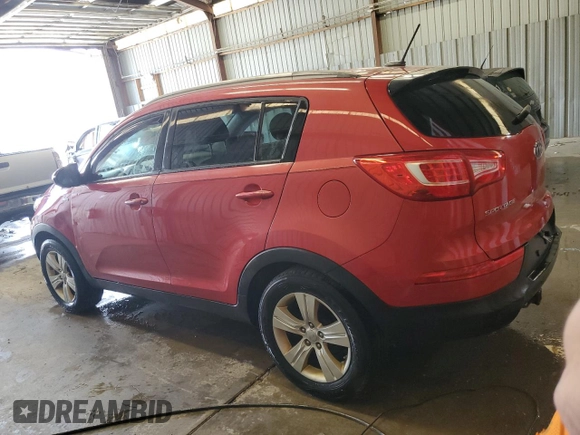 2012 Kia Sportage LX with VIN KNDPBCA2XC7221238, listed as a Copart auction lot 53683495 with 217,313 mi miles and Salvage Title. Bid and sale history available at DreamBid. Image 2.
