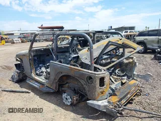 2014 Jeep Wrangler Rubicon with VIN 1C4BJWCG6EL126340, listed as a IAAI auction lot 42654467 with Not provided miles and . Bid and sale history available at DreamBid. Image 3.