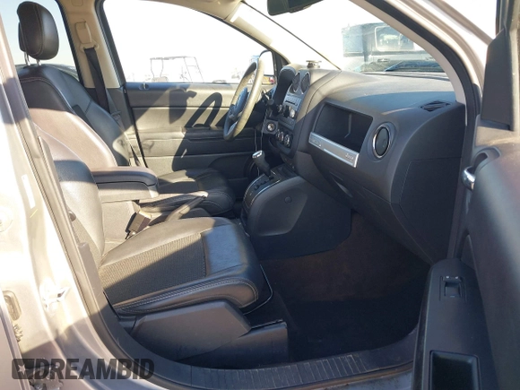 2016 Jeep Compass Sport with VIN 1C4NJDBB1GD587577, listed as a IAAI auction lot 41403682 with 54,158 mi miles and . Bid and sale history available at DreamBid. Image 5.