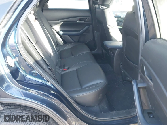 2020 Mazda CX-30 Select with VIN 3MVDMBCL9LM126154, listed as a IAAI auction lot 41492799 with 51,977 mi miles and . Bid and sale history available at DreamBid. Image 8.