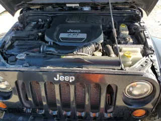 2013 Jeep Wrangler Sport with VIN 1C4AJWAG0DL618634, listed as a Copart auction lot 48982315 with 251,955 mi miles and Clean Title. Bid and sale history available at carsss.com. Image 11.