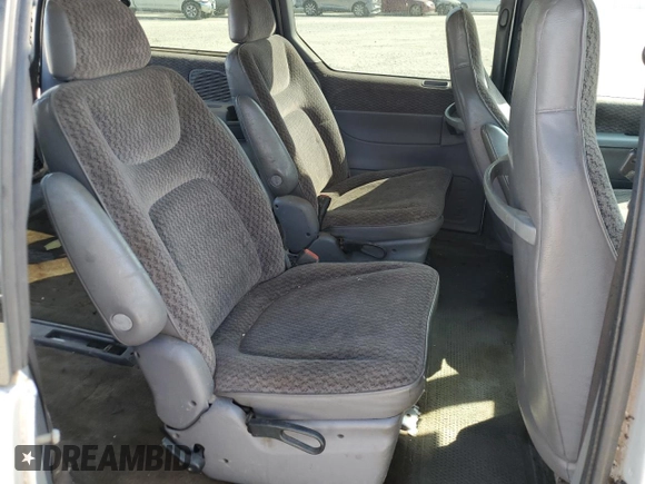 2000 Dodge Caravan SE with VIN 2B4GP45G0YR525310, listed as a Copart auction lot 69596394 with 299,957 mi miles and Salvage Title. Bid and sale history available at carsss.com. Image 12.