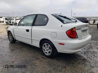 2004 Hyundai Accent GL with VIN KMHCG35C84U285750, listed as a Copart auction lot 85443094 with 167,169 mi miles and Salvage Title. Bid and sale history available at carsss.com. Image 2.