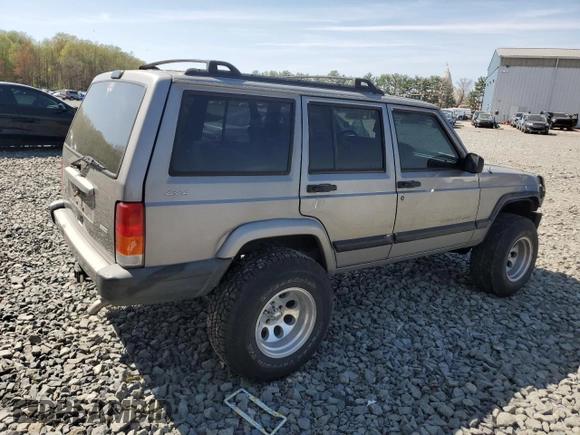 2000 Jeep Cherokee z VIN 1J4FF48S9YL220831, wystawiony jako Copart lot #54304615 z przebiegiem Nie podano mil oraz Szkoda całkowita • Salvage title. Historia ofert i sprzedaży dostępna na DreamBid. Obrazek 3.