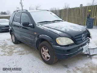 2001 Mercedes-Benz M-Class with VIN 4JGAB54E21A252034, listed as a IAAI auction lot 41573177 with 168,672 mi miles. Bid and sale history available at carsss.com. Image 1.