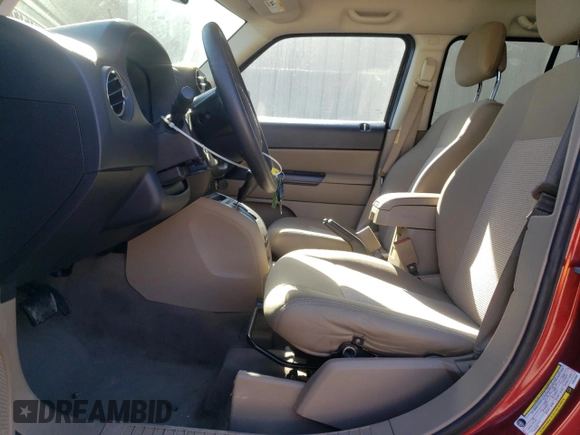 2012 Jeep Patriot Sport with VIN 1C4NJRBBXCD525330, listed as a Copart auction lot 77744554 with 170,549 mi miles and Salvage Title. Bid and sale history available at carsss.com. Image 7.