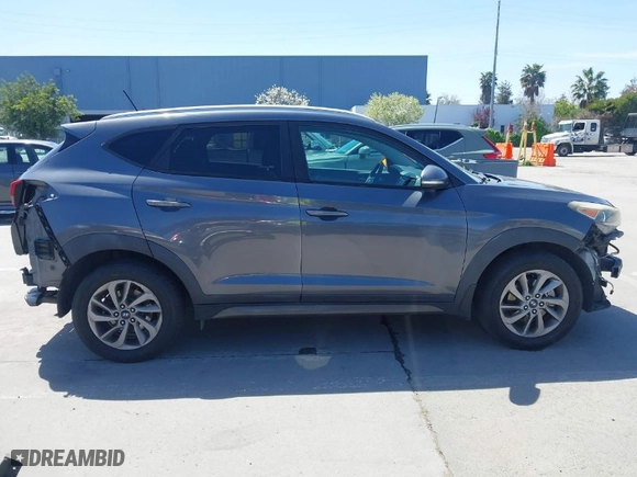 2016 Hyundai Tucson Eco with VIN KM8J3CA24GU230264, listed as a IAAI auction lot 41968258 with 157,951 mi miles. Bid and sale history available at carsss.com. Image 14.