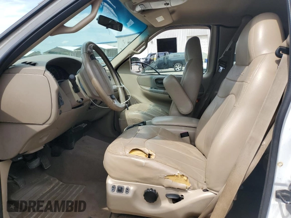 2001 Ford F-150 XL with VIN 1FTRX08L51KE49004, listed as a Copart auction lot 60470745 with 199,490 mi miles and Salvage title. Bid and sale history available at DreamBid. Image 7.