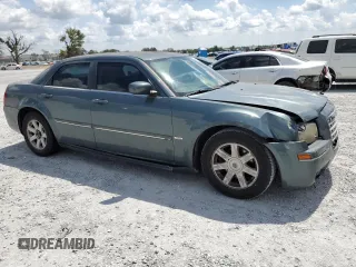 2005 Chrysler 300 Touring z VIN 2C3JA53G95H546536, wystawiony jako Copart lot #60667575 z przebiegiem 163 625 mil mil oraz Szkoda całkowita • Salvage title. Historia ofert i sprzedaży dostępna na DreamBid. Obrazek 4.