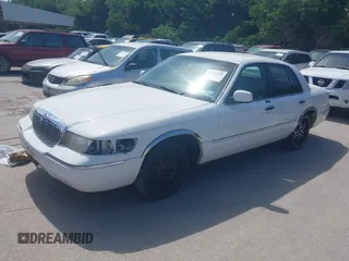 2000 Mercury Grand Marquis LS z VIN 2MEFM75W2YX731383, wystawiony jako IAAI lot #42262528 z przebiegiem 172 940 mil mil oraz . Historia ofert i sprzedaży dostępna na DreamBid. Obrazek 2.