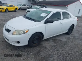 2010 Toyota Corolla with VIN 2T1BU4EE5AC529444, listed as a IAAI auction lot 41914171 with 185,398 mi miles. Bid and sale history available at carsss.com. Image 2.