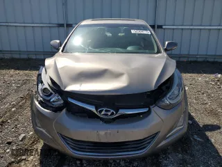 2014 Hyundai Elantra Limited z VIN 5NPDH4AEXEH477637, wystawiony jako Copart lot #52564715 z przebiegiem 131 561 mil mil oraz Szkoda całkowita • Salvage title. Historia ofert i sprzedaży dostępna na DreamBid. Obrazek 5.