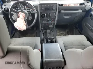 2009 Jeep Wrangler Unlimited Rubicon with VIN 1J4GA69199L713060, listed as a Copart auction lot 58543595 with 159,981 mi miles and Clean title. Bid and sale history available at DreamBid. Image 8.