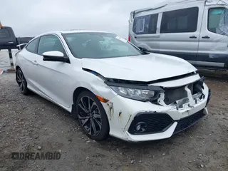 2018 Honda Civic Si z VIN 2HGFC3A52JH751998, wystawiony jako IAAI lot #42415499 z przebiegiem 58 088 mil mil oraz . Historia ofert i sprzedaży dostępna na DreamBid. Obrazek 1.