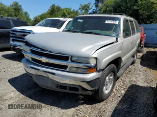 2004 Chevrolet Suburban LT with VIN 1GNFK16Z74J199944, listed as a Copart auction lot 62146315 with 220,420 mi miles and Salvage title. Bid and sale history available at DreamBid. Image 1.