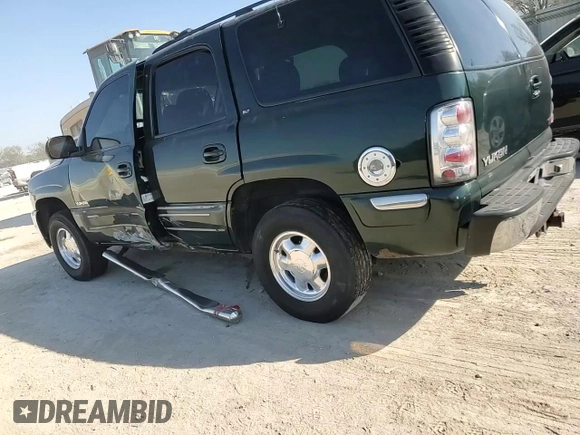2001 GMC Yukon SLT with VIN 1GKEK13TX1J168370, listed as a Copart auction lot 50636635 with 276,374 mi miles and Salvage Title. Bid and sale history available at carsss.com. Image 12.