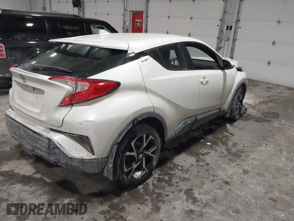 2018 Toyota C-HR XLE with VIN NMTKHMBX5JR027307, listed as a IAAI auction lot 41598077 with 123,032 mi miles. Bid and sale history available at carsss.com. Image 4.