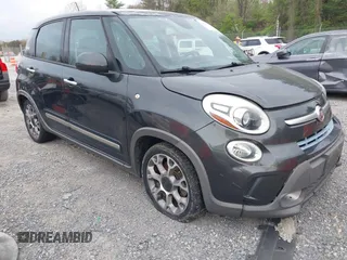 2014 FIAT 500L Trekking with VIN ZFBCFADH3EZ011646, listed as a IAAI auction lot 42107103 with 179,995 mi miles. Bid and sale history available at carsss.com. Image 1.