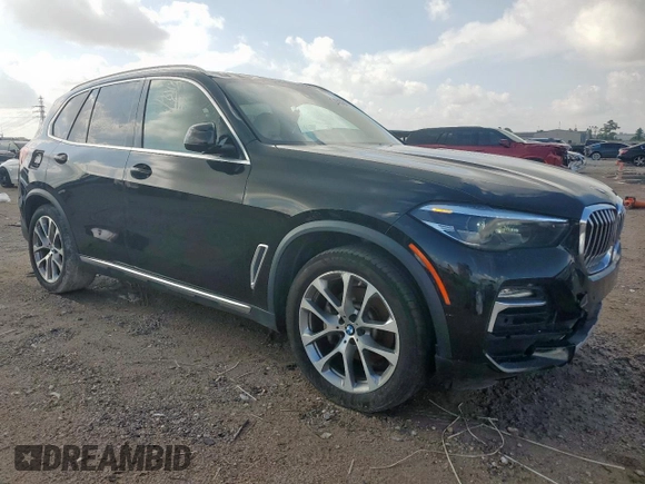 2019 BMW X5 xDrive40i with VIN 5UXCR6C54KLL35873, listed as a Copart auction lot 64989745 with 129,538 mi miles and Salvage title. Bid and sale history available at DreamBid. Image 4.