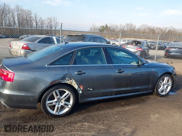 2014 Audi A6 Prestige with VIN WAUHGBFC8EN104920, listed as a IAAI auction lot 41827864 with 70,289 mi miles and . Bid and sale history available at DreamBid. Image 13.