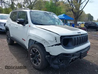 2023 Jeep Renegade Trailhawk z VIN ZACNJDC16PPP73152, wystawiony jako IAAI lot #42128199 z przebiegiem 2 779 mil mil oraz . Historia ofert i sprzedaży dostępna na DreamBid. Obrazek 1.