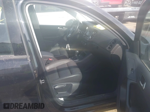 2017 Volkswagen Tiguan S with VIN WVGBV7AX9HK018085, listed as a IAAI auction lot 41804052 with 71,943 mi miles and . Bid and sale history available at DreamBid. Image 5.