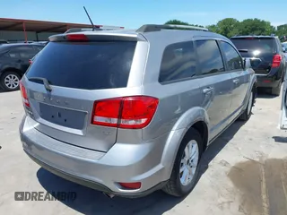 2017 Dodge Journey SXT z VIN 3C4PDDBGXHT618056, wystawiony jako IAAI lot #42241207 z przebiegiem 146 430 mil mil oraz . Historia ofert i sprzedaży dostępna na DreamBid. Obrazek 4.