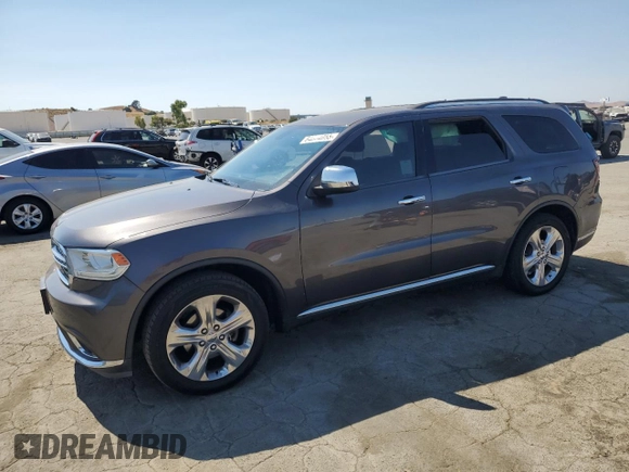 2015 Dodge Durango SXT with VIN 1C4RDHAG4FC127816, listed as a Copart auction lot 64864055 with 134,780 mi miles and Salvage title. Bid and sale history available at DreamBid. Image 1.