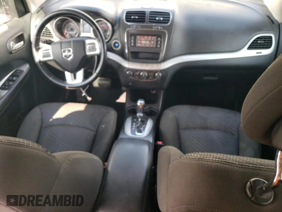 2012 Dodge Journey SXT с VIN 3C4PDCCG7CT211927, выставлен на аукционе Copart как лот 77769624 с пробегом 136 819 миль миль и Списание • Salvage title. История ставок и продаж доступна на DreamBid. Изображение 8.