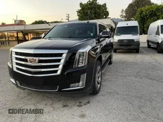 2018 Cadillac Escalade ESV Luxury z VIN 1GYS3HKJ2JR139302, wystawiony jako Copart lot #74639524 z przebiegiem 154 097 mil mil oraz Czysty tytuł • Clean title. Historia ofert i sprzedaży dostępna na DreamBid. Obrazek 2.