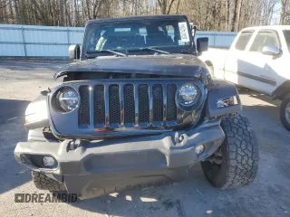 2022 Jeep Wrangler Unlimited Sport with VIN 1C4HJXDG6NW144897, listed as a Copart auction lot 83474284 with Not Provided miles and Salvage Title. Bid and sale history available at DreamBid. Image 5.