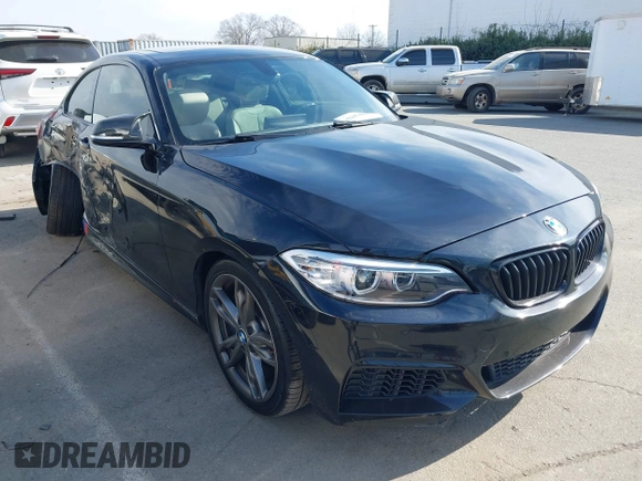 2015 BMW 2 Series M235i with VIN WBA1J7C55FV358964, listed as a IAAI auction lot 41674800 with 63,504 mi miles and . Bid and sale history available at carsss.com. Image 1.